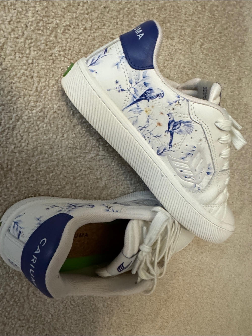 Women’s white leather with blue artwork